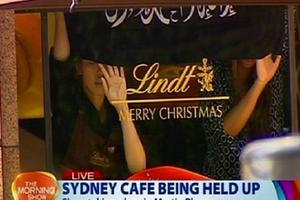 Nhiều con tin đang bị giữ trong quán cafe Sydney