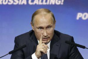 Putin chỉ trích Mỹ thả 50 tấn đạn cho phe nổi dậy Syria