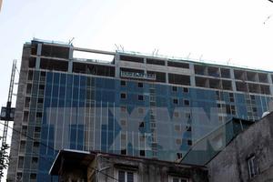 Bác bỏ tin dừng cưỡng chế phá dỡ phần sai phạm tại tòa 8B Lê Trực