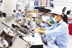 Đẩy nhanh tiến độ ban hành văn bản hướng dẫn Luật doanh  nghiệp, Luật đầu tư