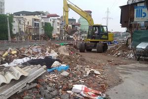 Đã xuất hiện xe máy xúc xử lý bãi rác