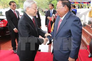 Báo chí Lào đưa tin đậm nét về chuyến thăm của Tổng Bí thư 