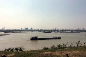 Lợi dụng “dự án nạo vét duy tu” ngang nhiên rút ruột sông Hồng
