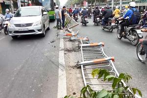 Xe bồn cày nát dải phân cách, đâm sập tường công ty