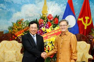 Phó Thủ tướng Phạm Bình Minh chúc mừng Tết cổ truyền Bunpimay của Lào