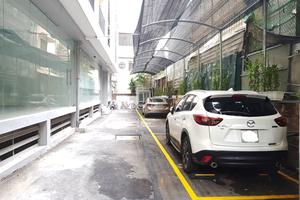 Lập bãi trông xe không phép trên bể nước cứu hỏa?