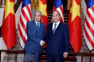 Thủ tướng Nguyễn Xuân Phúc đón, hội đàm với Thủ tướng Malaysia