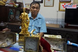 Giám định tượng đồng mạ vàng nhồi xi măng, không có vàng, dùng 12 tạp chất