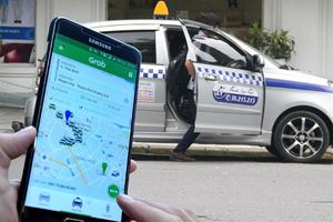 Taxi công nghệ đăng ký “vận tải taxi” phải gắn hộp đèn