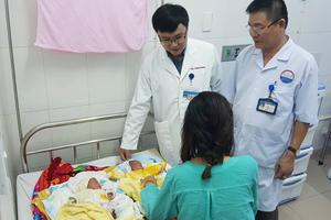 Cặp song sinh đầu tiên ra đời bằng phương pháp thụ tinh ống nghiệm