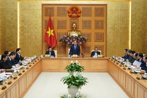 Không để Việt Nam rơi vào vòng xoáy dịch vi rút Corona