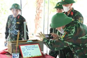 Lấy mẫu sinh phẩm tại nghĩa trang có nhiều mộ vô danh nhất Nghệ An