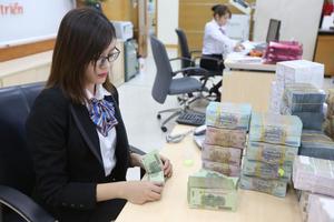 Làn sóng cắt giảm nhân sự tiếp diễn tại các ngân hàng